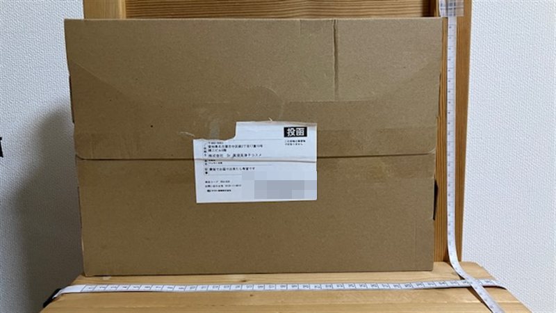 ネコポスで届いた箱と投函の印字